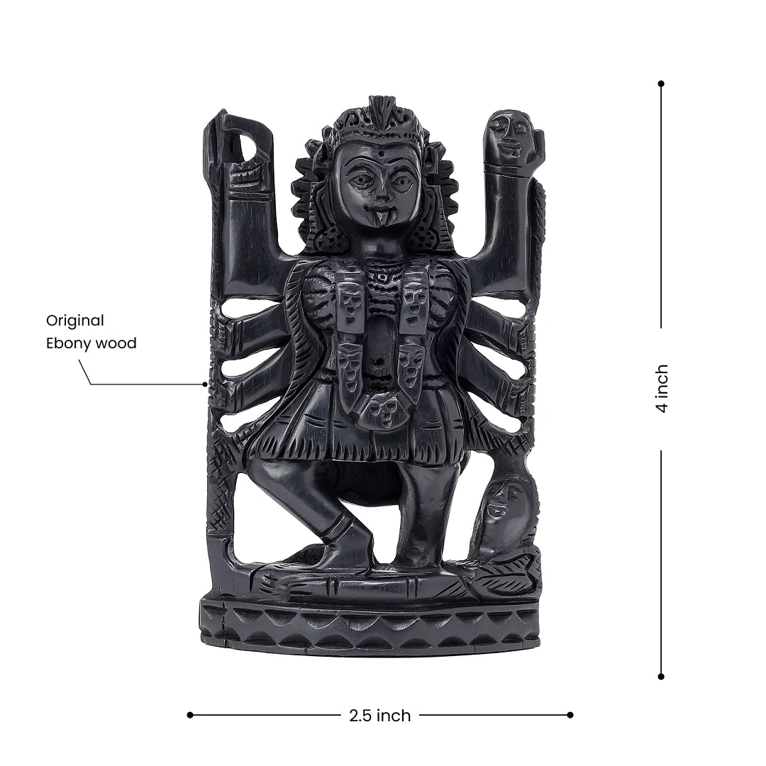 Goddess Kali idol, 4 inches tall, with multiple arms, made from Ebony wood.